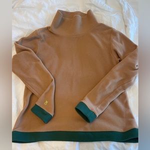 Tan Dudley Stephen’s turtleneck with green trim.  Medium.  Good used condition.